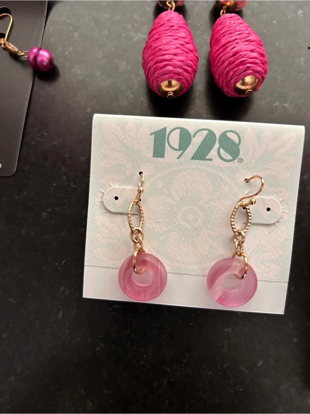7 pair pierced earrings, drop style, most never worn, gold tone metals.